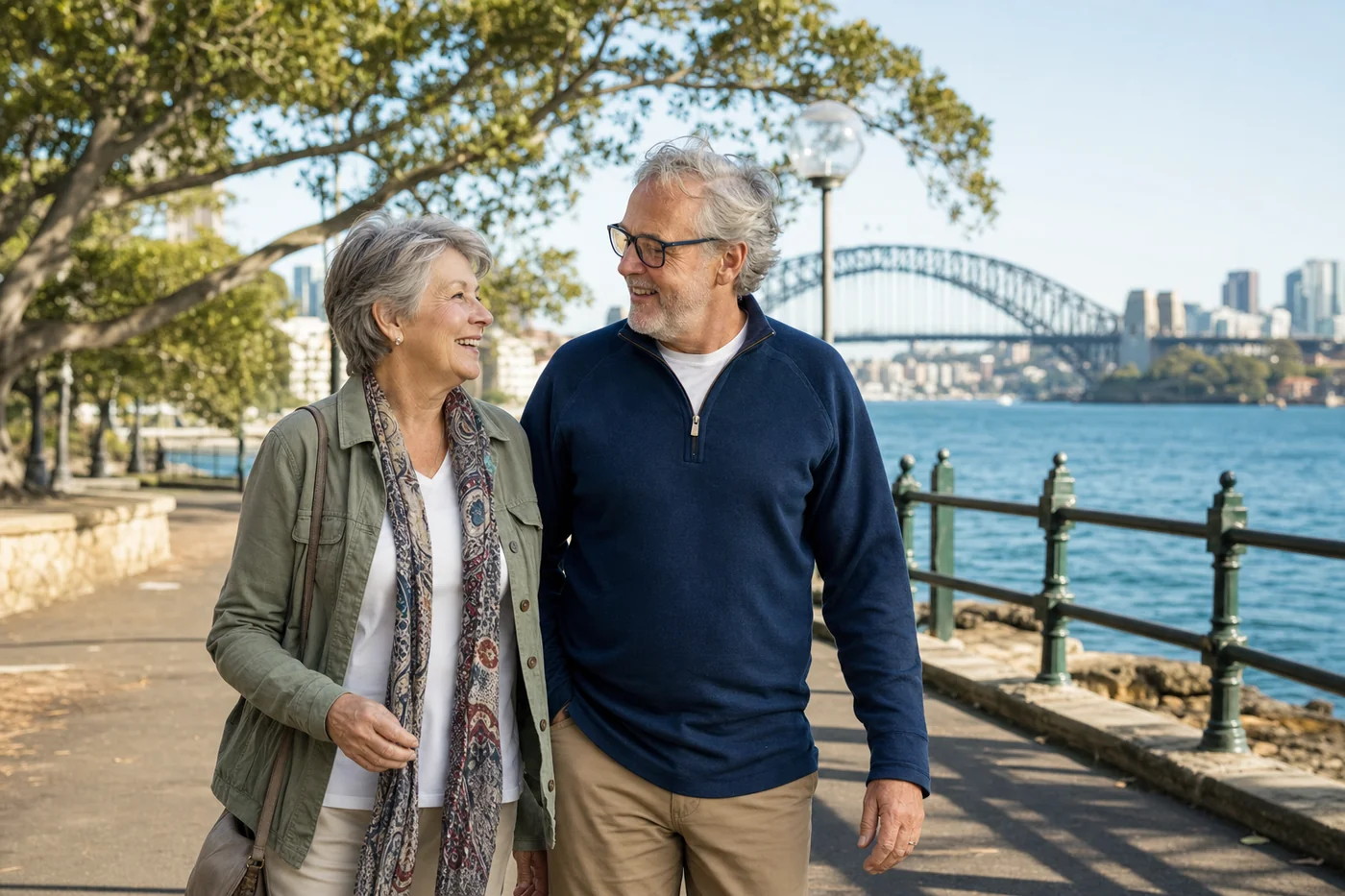Mature couple walking beside Sydney Harbour